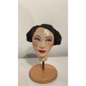 Sculpture céramique cuisson raku du visage d'une femme