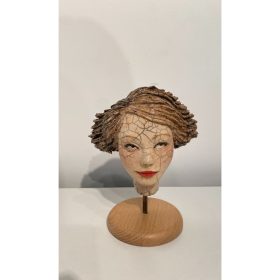 Sculpture céramique cuisson raku du visage d'une femme