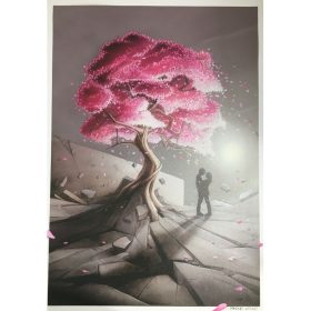 Un jeune couple sous un arbre rose